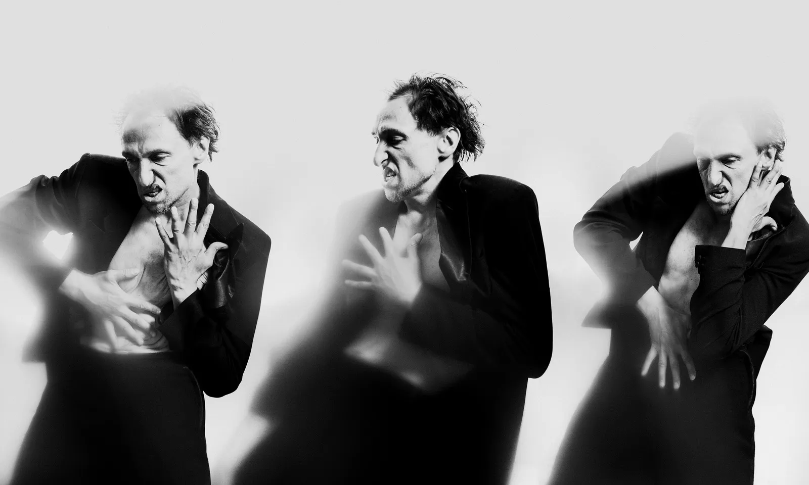Three black-and-white frames of a gaunt actor in black, his hands twisted like claws.