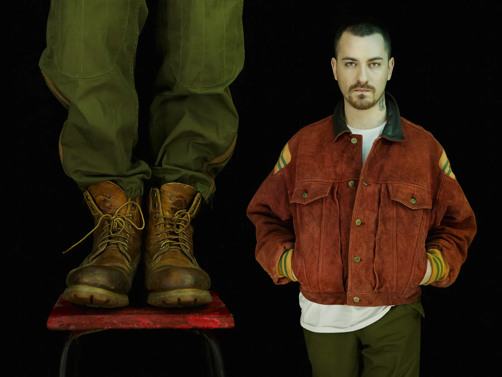 Worn leather boots on a red stool beside a man in a red suede jacket.