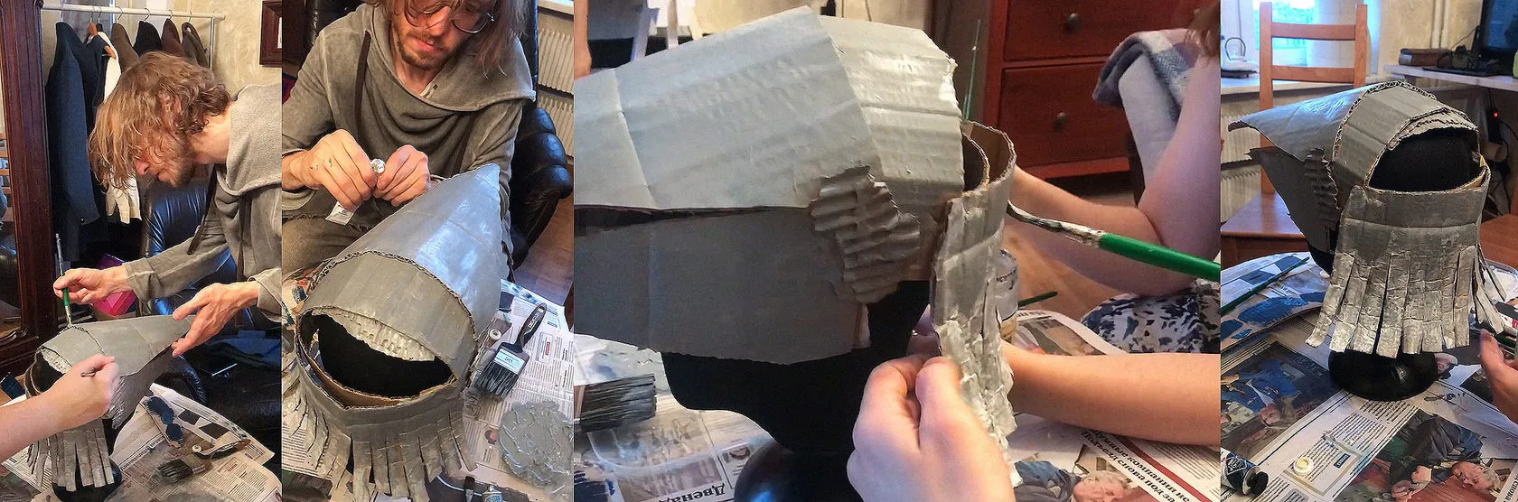 Making the masks: hands shape, paint and fit grey cardboard over a head form.