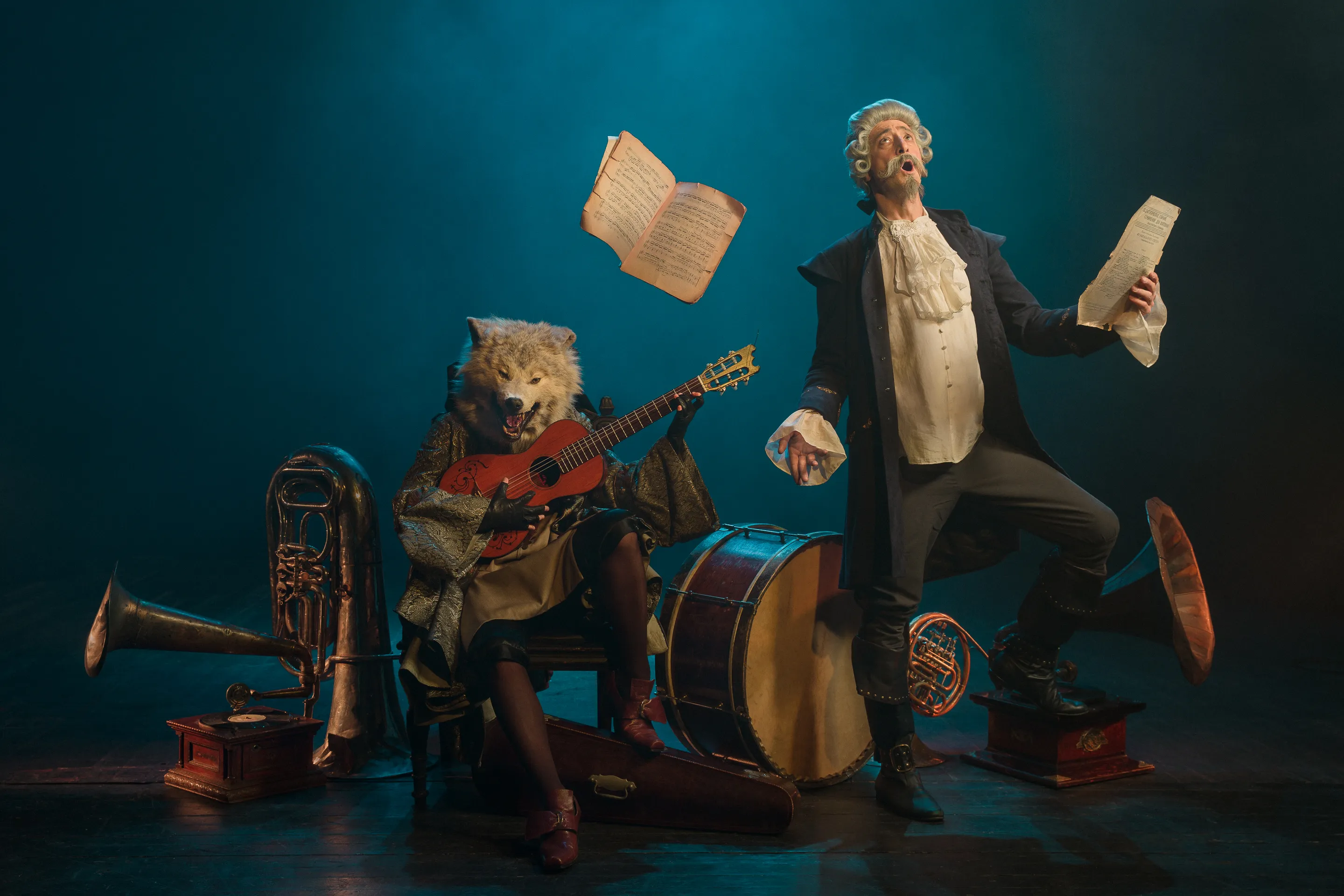 Baron Munchausen key visual by Andrei Kovalev: costumed characters perform as a ramshackle band, one with a wolf's head.