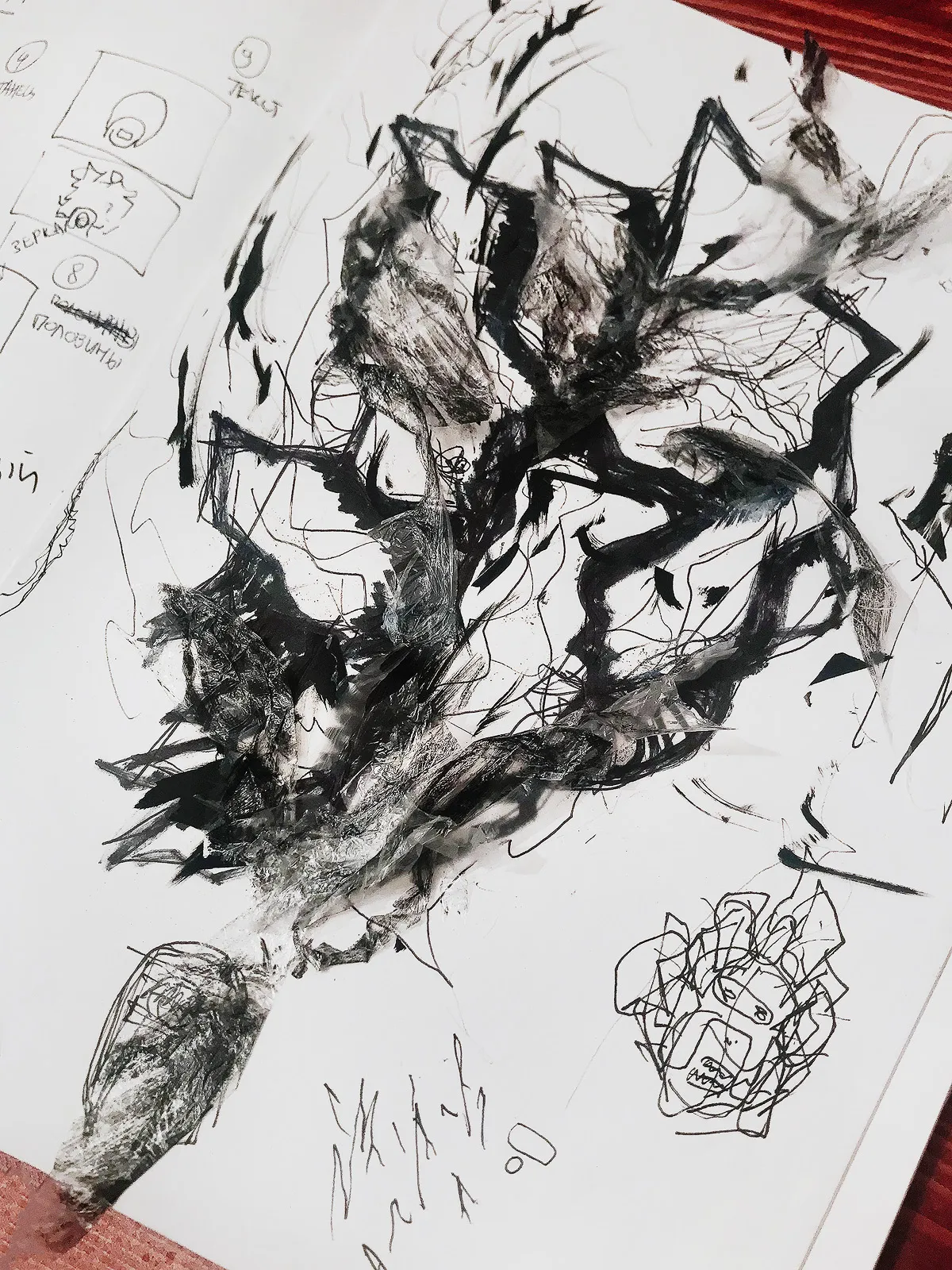 My ink sketch of the Chaos mask, with storyboard frames in the margin.