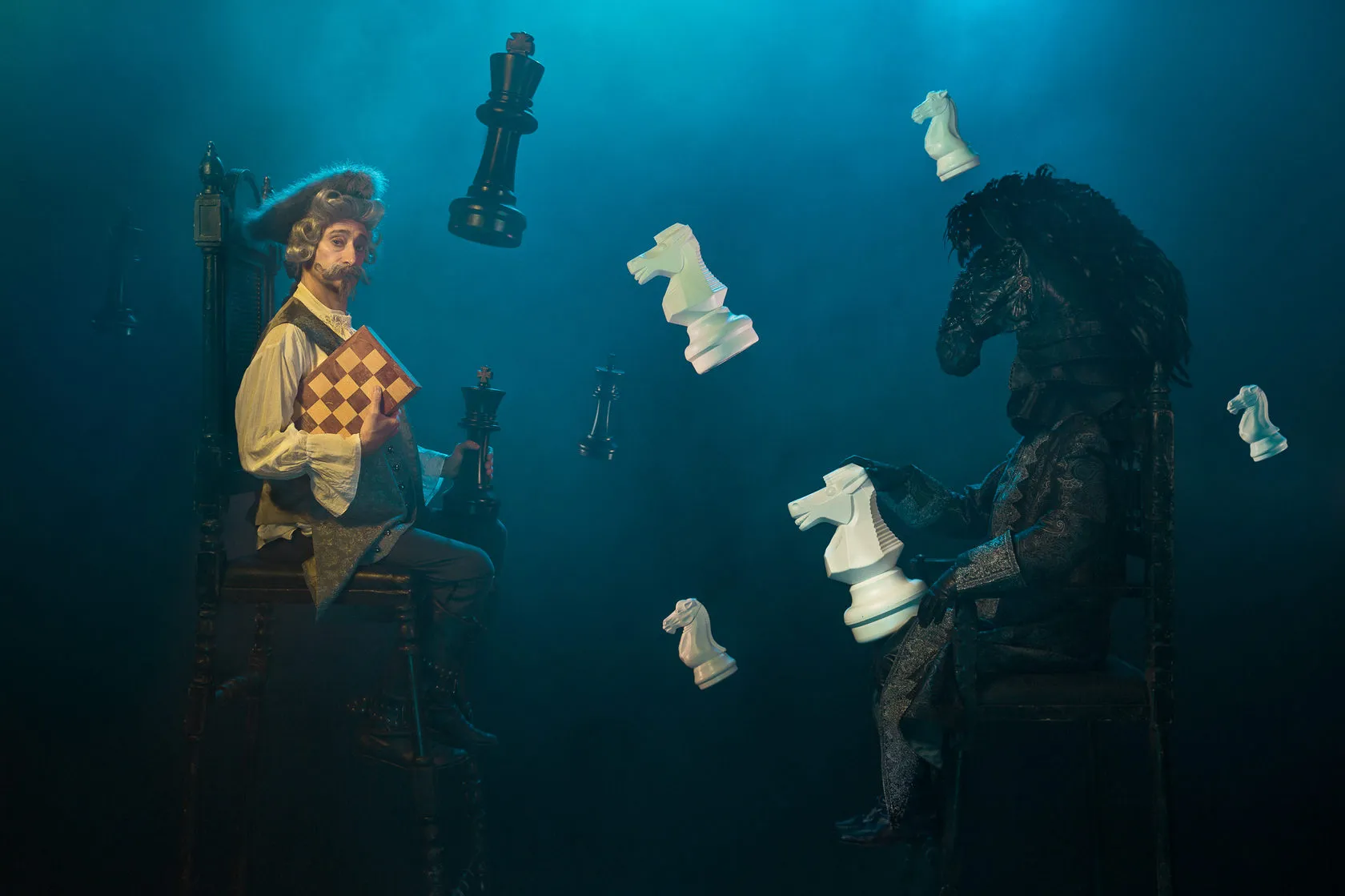 The Baron plays chess with a horse-headed figure as giant chess pieces float around them.