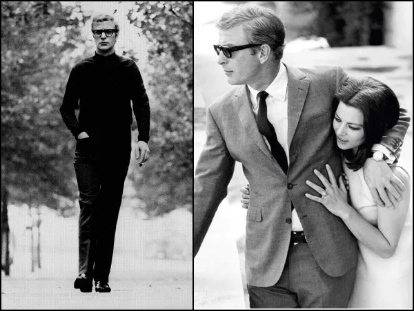 Reference: a man in black-rimmed glasses, walking in a polo neck and posing in a grey suit.