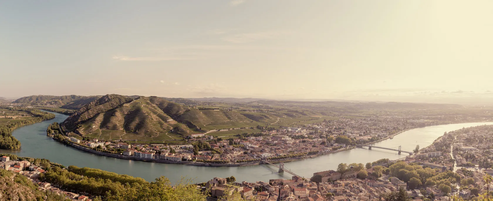 Jean-Louis Chave cover story by Andrei Kovalev: the river winds past a town below vineyard hills.